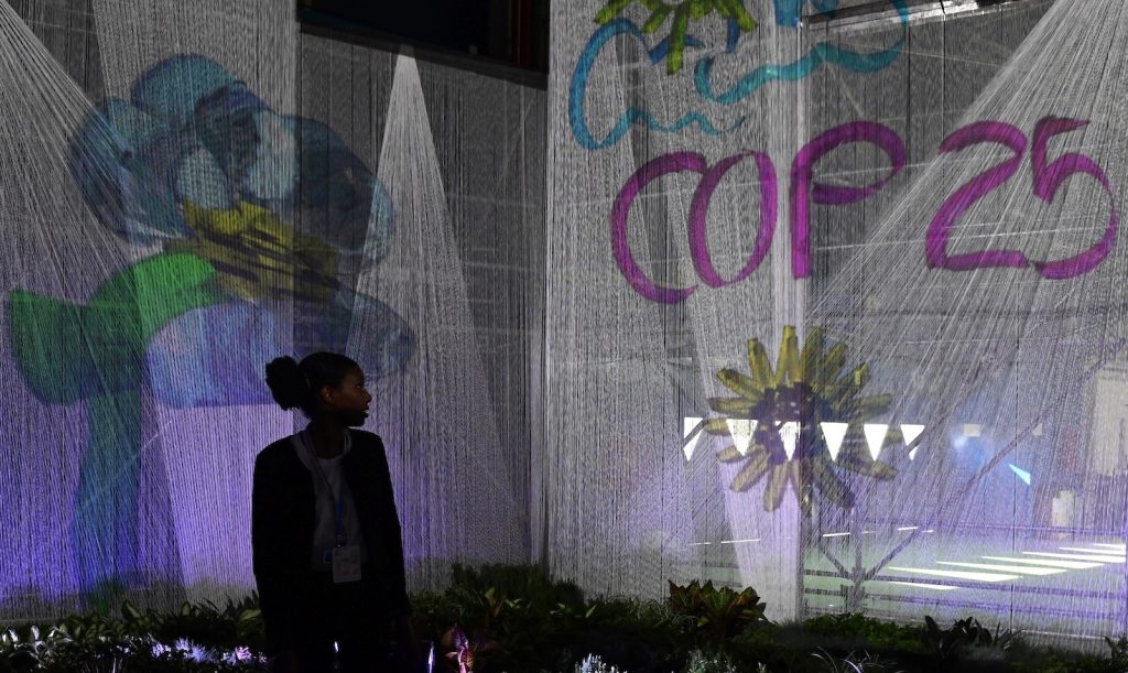 La 25.ma conferenza si apre a Madrid nel segno di due emergenze che hanno turbato profondamente l’opinione pubblica: Venezia e l'Amazzonia (AFP)