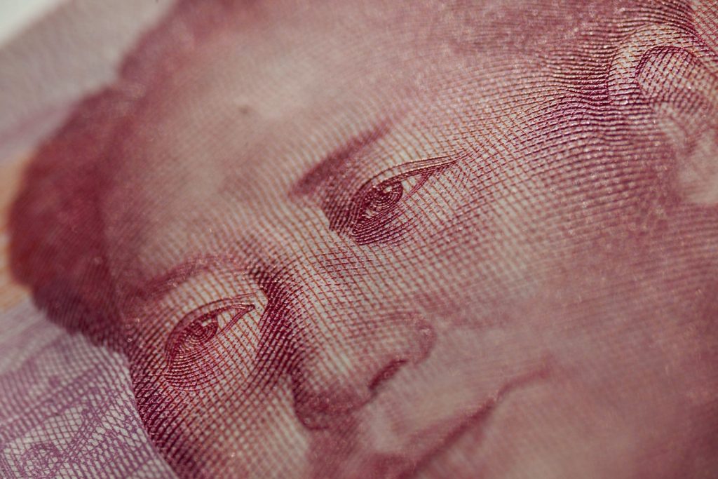 Un dettaglio del ritratto di Mao su una banconota da 100 renminbi (Keystone)