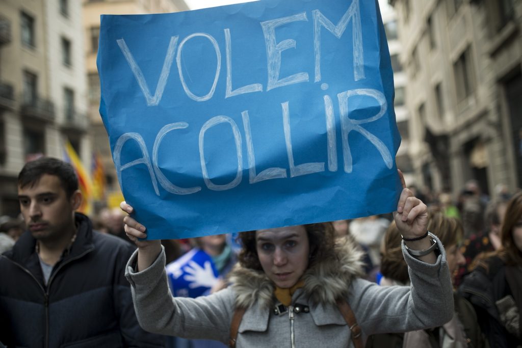 Barcellona vuole dare il benvenuto ai rifugiati durante una manifestazione del 18 febbraio (AFP)