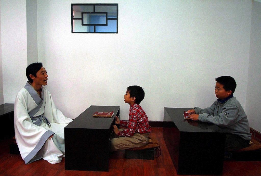 Gli insegnamenti di Confucio vengono impartiti in una scuola di Suzhou nell’est della Cina (Keystone)