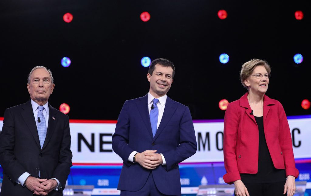 Per Pete Buttigieg (al centro), Elizabeth Warren e Mike Bloomberg la corsa è finita (AFP)