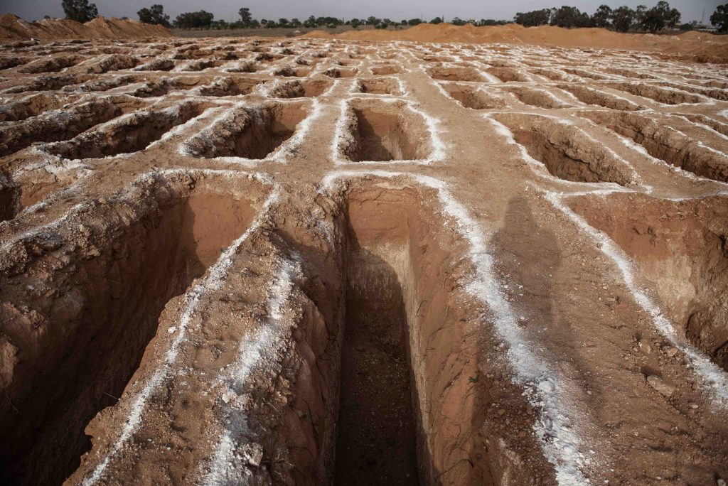 Fossa comune a Tarhouna (Romenzi)