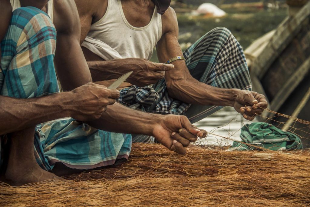 La riparazione delle reti da pesca