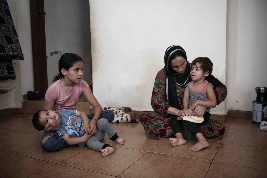 Fatma con alcuni dei suoi figli (Romenzi)