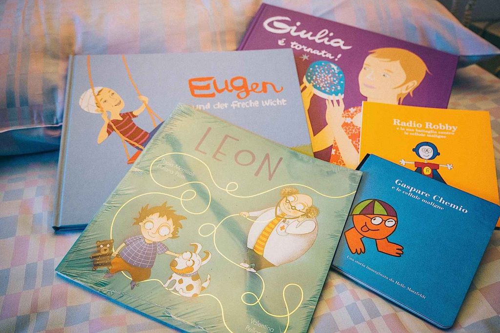 Alcuni libri che trattano il tema dei tumori pediatrici destinati ai bambini
