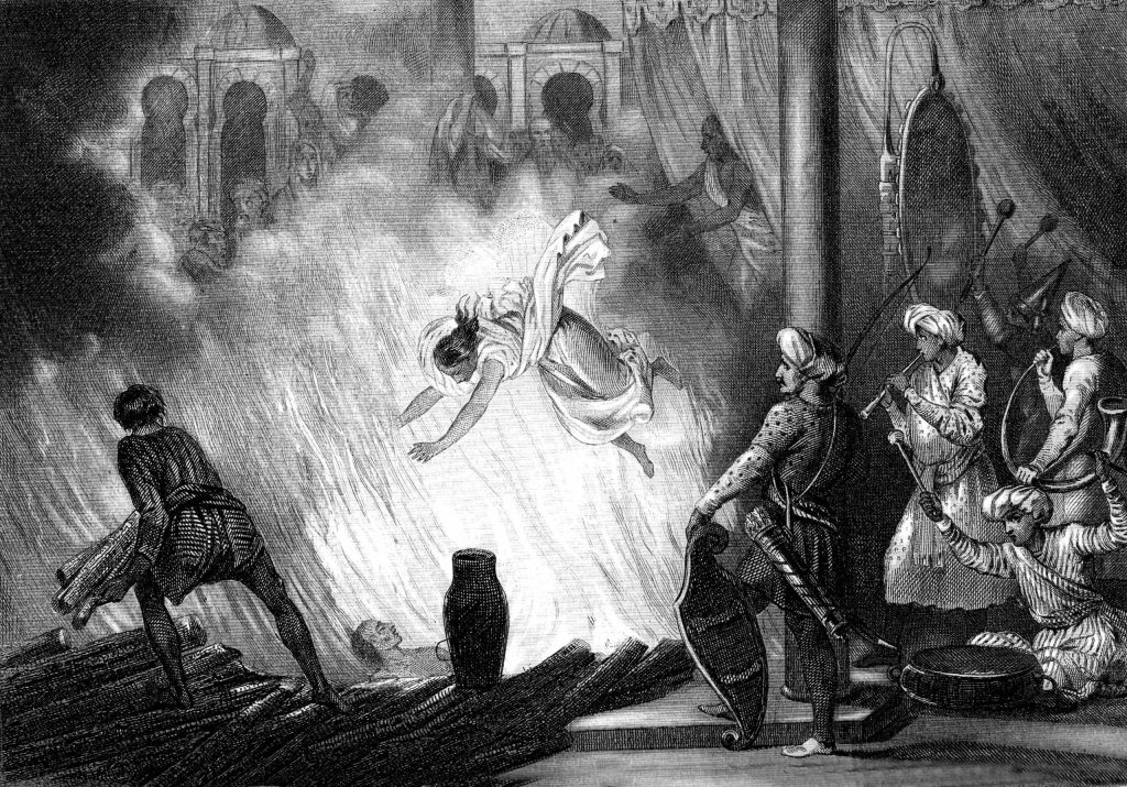 Illustrazione del 1874 che mostra una vedova sulla pira funeraria del marito (Keystone)